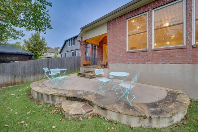 a view of a backyard with a garden