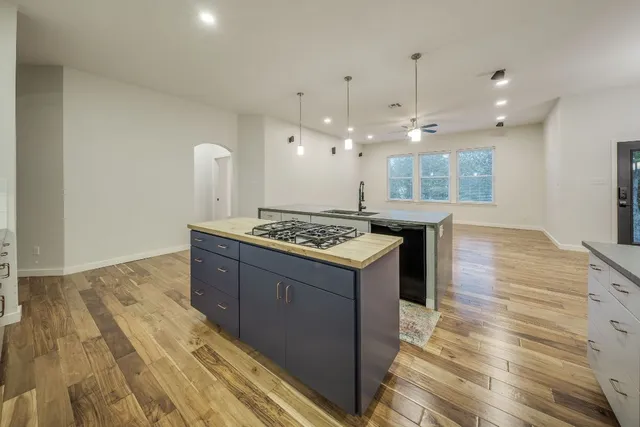 an aerial view of a house with yard swimming pool and outdoor seating