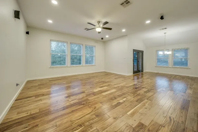 a kitchen with a stove and a refrigerator