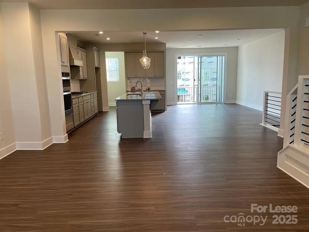 3121 Treble Court Charlotte, NC 28262 - Photo 2 of 14 a view of kitchen and dining room with wooden floor
