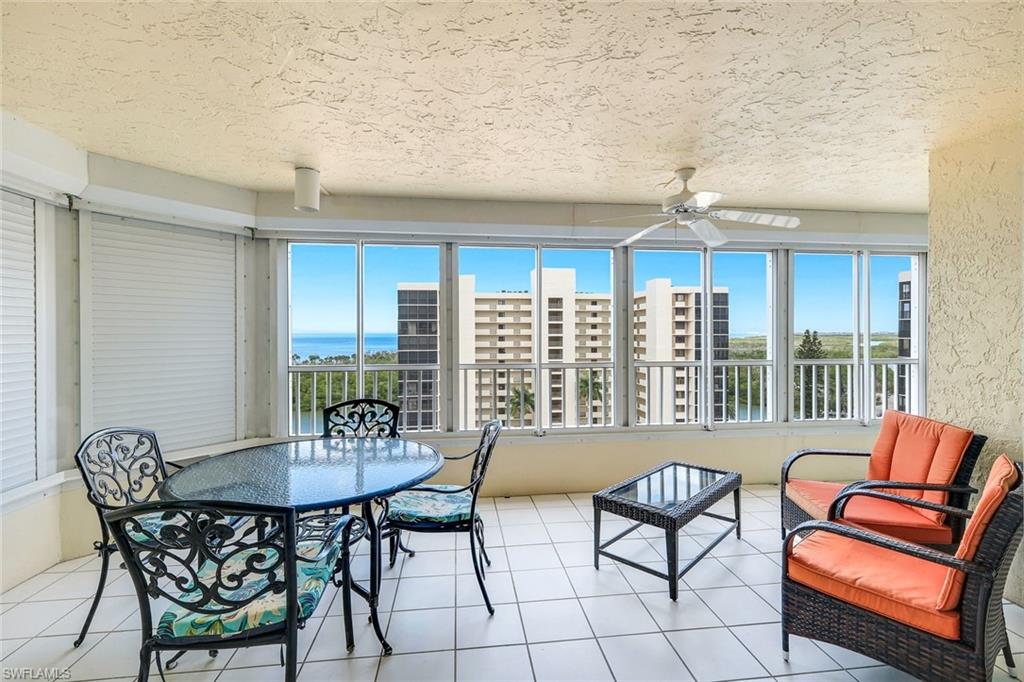 21 Bluebill Avenue, Unit B905 Naples, FL 34108 - Photo 24 of 35 a view of a dining room with furniture window and outside view
