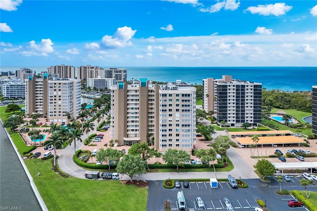 21 Bluebill Avenue, Unit B905 Naples, FL 34108 - Photo 28 of 35 a view of a city with tall buildings