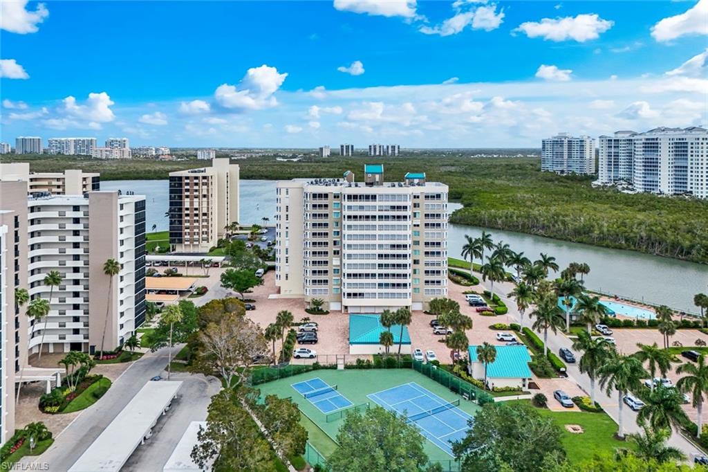 21 Bluebill Avenue, Unit B905 Naples, FL 34108 - Photo 29 of 35 a view of a city with tall buildings