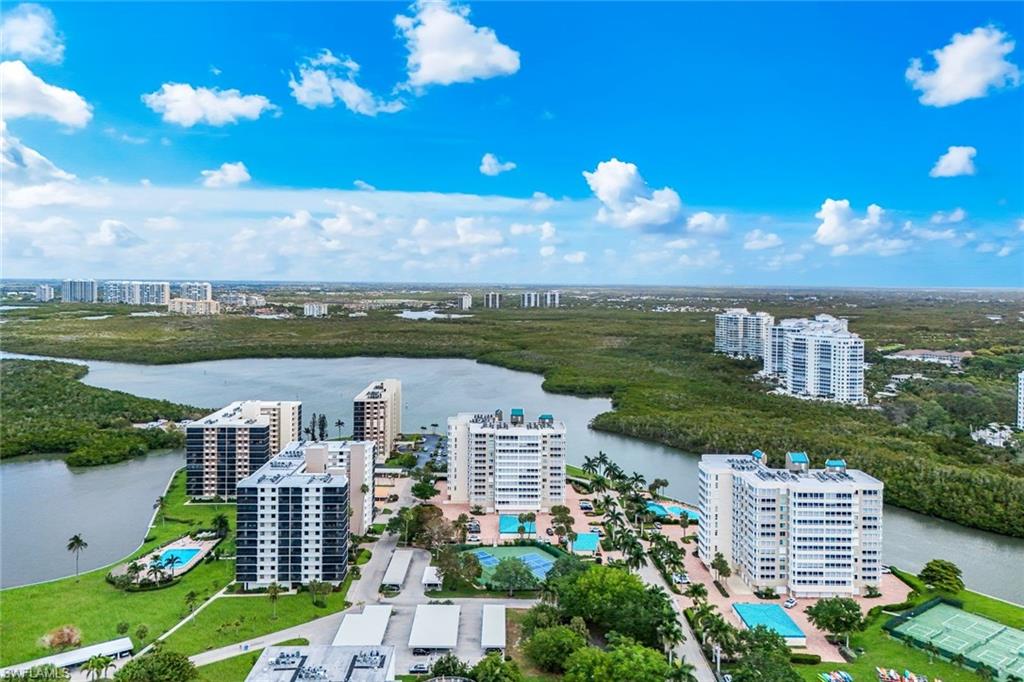 21 Bluebill Avenue, Unit B905 Naples, FL 34108 - Photo 32 of 35 a view of a city with tall buildings