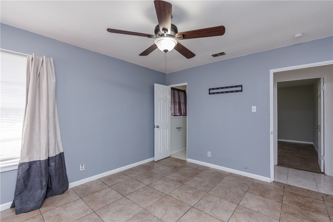 4122 Barnes Street Corpus Christi, TX 78411 - Photo 18 of 39 a view of an empty room with a window