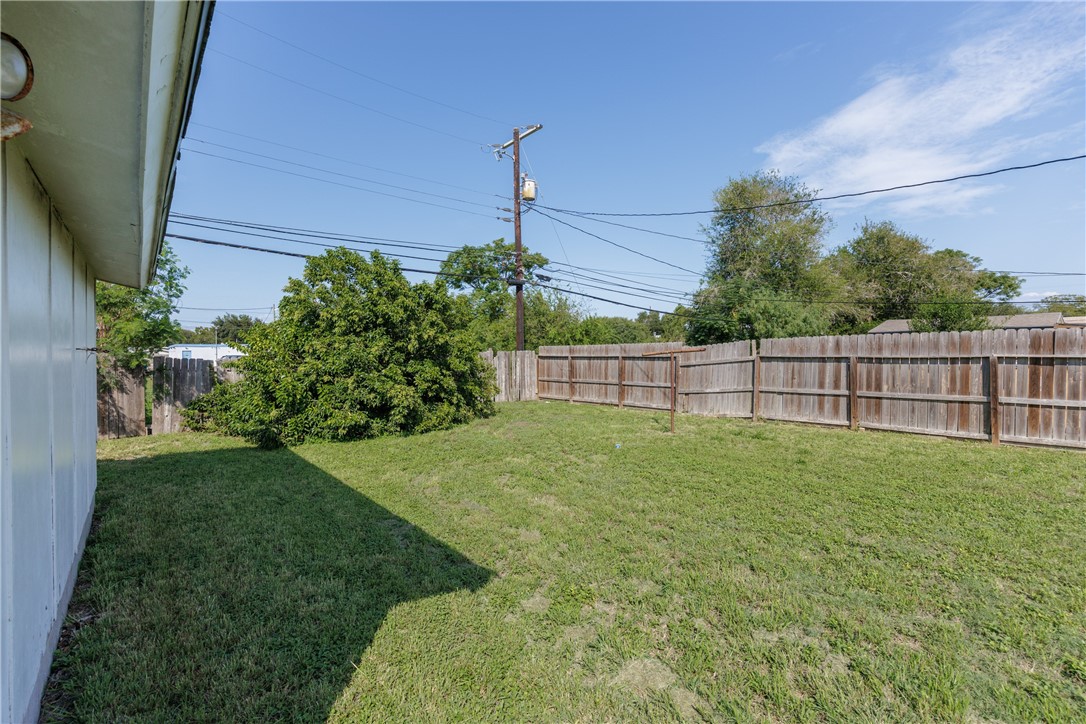 4122 Barnes Street Corpus Christi, TX 78411 - Photo 33 of 39 a view of yard with grass and plants