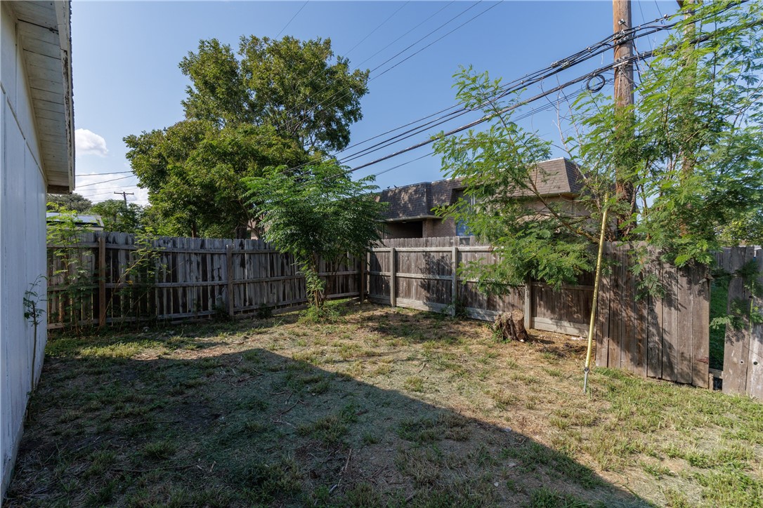 4122 Barnes Street Corpus Christi, TX 78411 - Photo 34 of 39 a view of a yard with a tree
