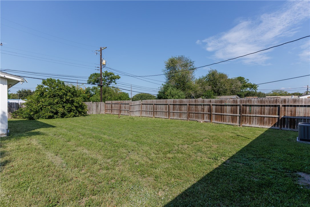 4122 Barnes Street Corpus Christi, TX 78411 - Photo 39 of 39 a view of a garden with a building in the background