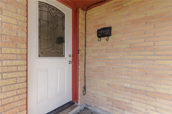 a bathroom with a shower and a mirror