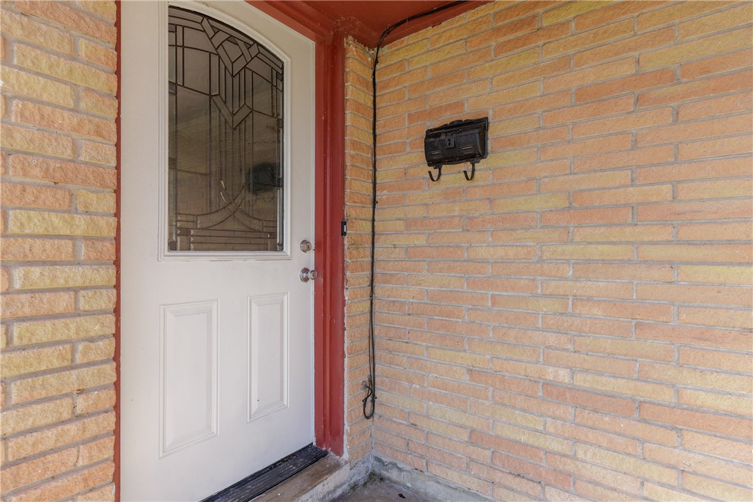 4122 Barnes Street Corpus Christi, TX 78411 - Photo 4 of 39 a bathroom with a shower and a mirror