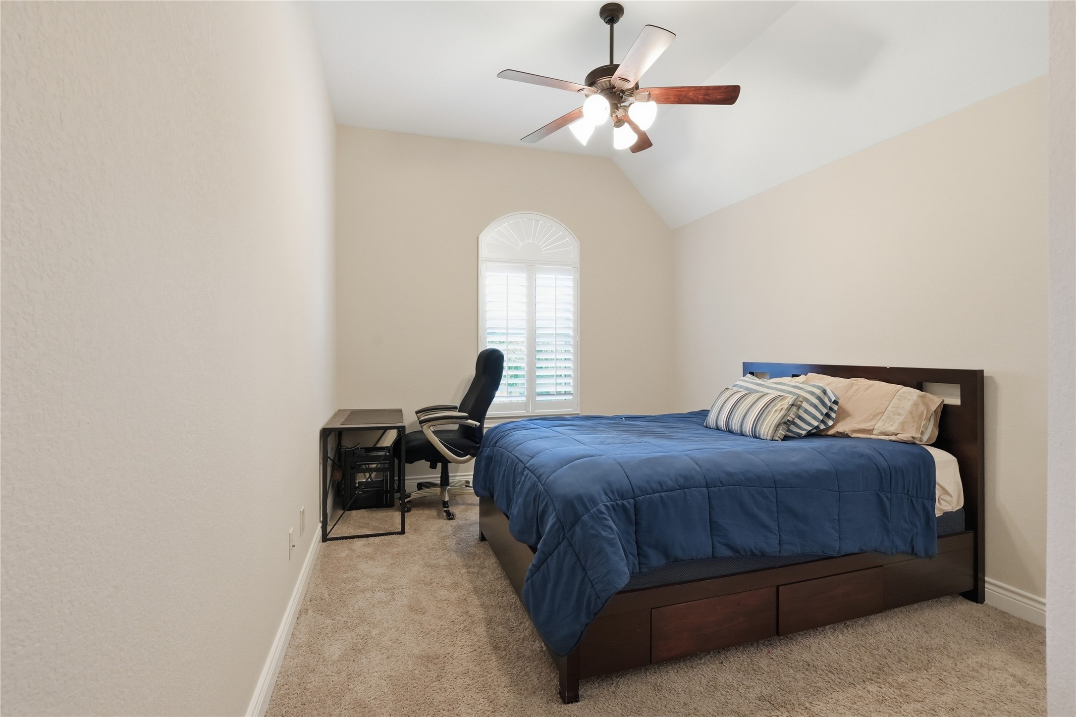 6429 Remlap Street Houston, TX 77055 - Photo 22 of 30 Secondary bedroom featuring soft natural light, a simple layout, and a calm, welcoming feel.