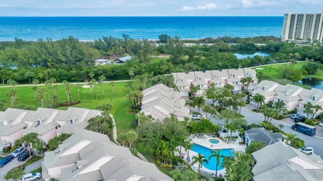 an aerial view of a house with garden view