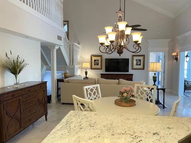 a view of a dining room and a chandelier