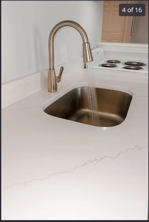 9 Avon Place, Unit 1 Haverhill, MA 01832 - Photo 4 of 16 a close view of sink and tap