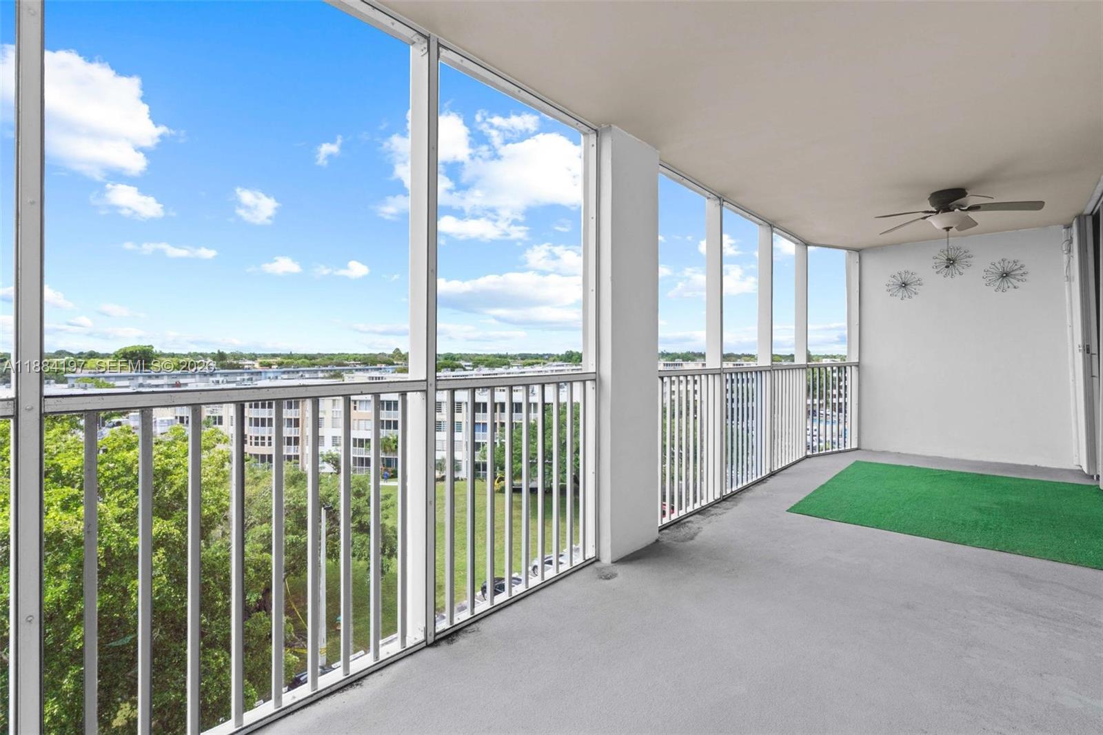 1750 Northeast 191st Street, Unit 7001 Miami, FL 33179 - Photo 16 of 30 a view of a balcony with city view