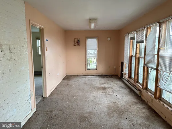 an empty room with windows