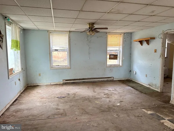 an empty room with windows