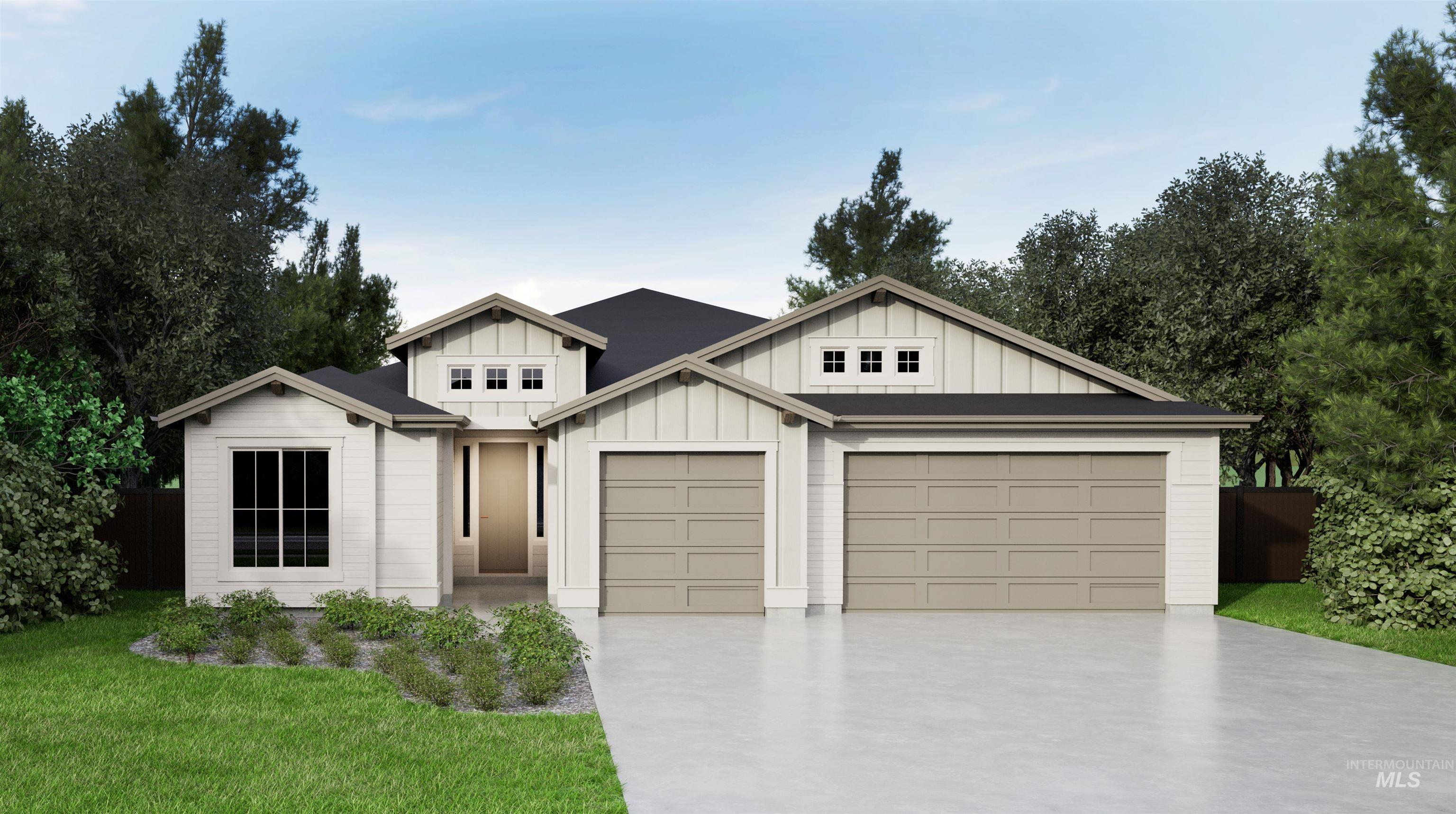 View of front of property with board and batten siding, driveway, and a garage