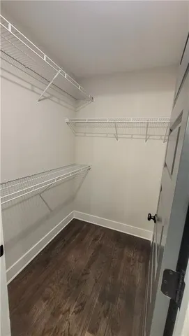 a view of a room with racks on the wall