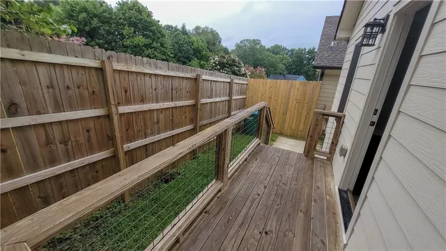 a view of wooden balcony with outdoor space