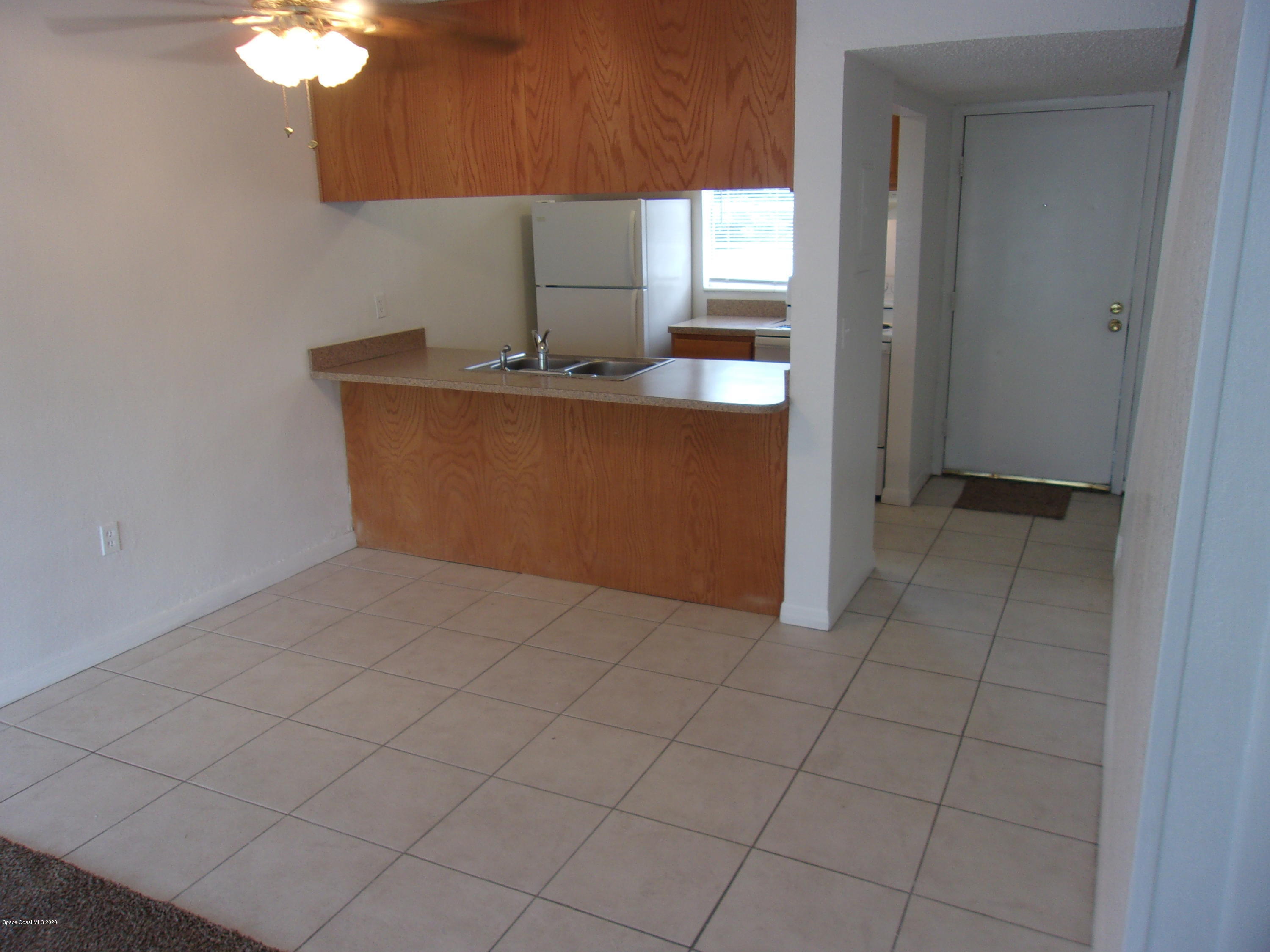 1711 Dixon Boulevard, Unit 242 Cocoa, FL 32922 - Photo 13 of 26 a room with a sink and a mirror