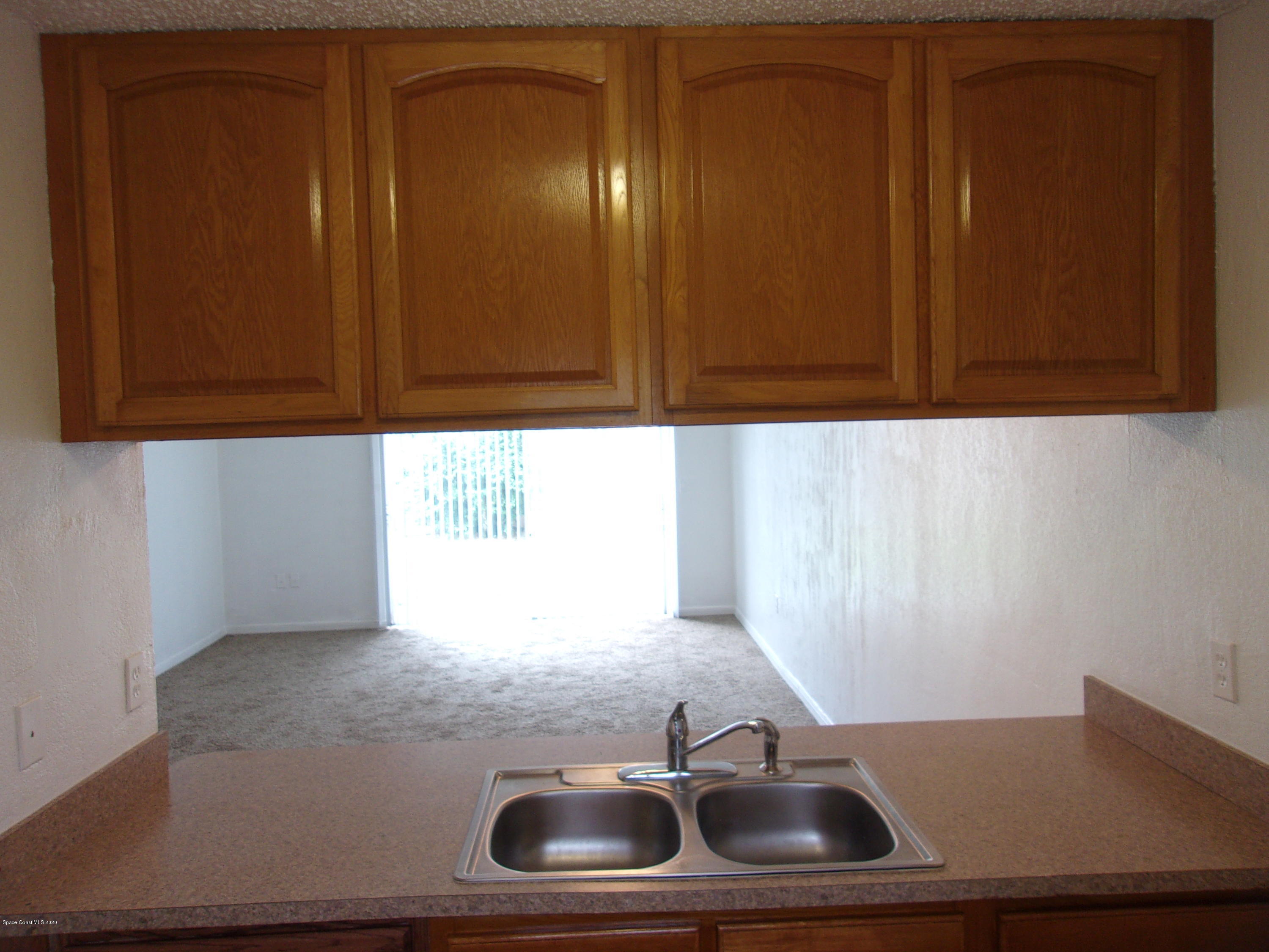 1711 Dixon Boulevard, Unit 242 Cocoa, FL 32922 - Photo 14 of 26 a bathroom with a sink