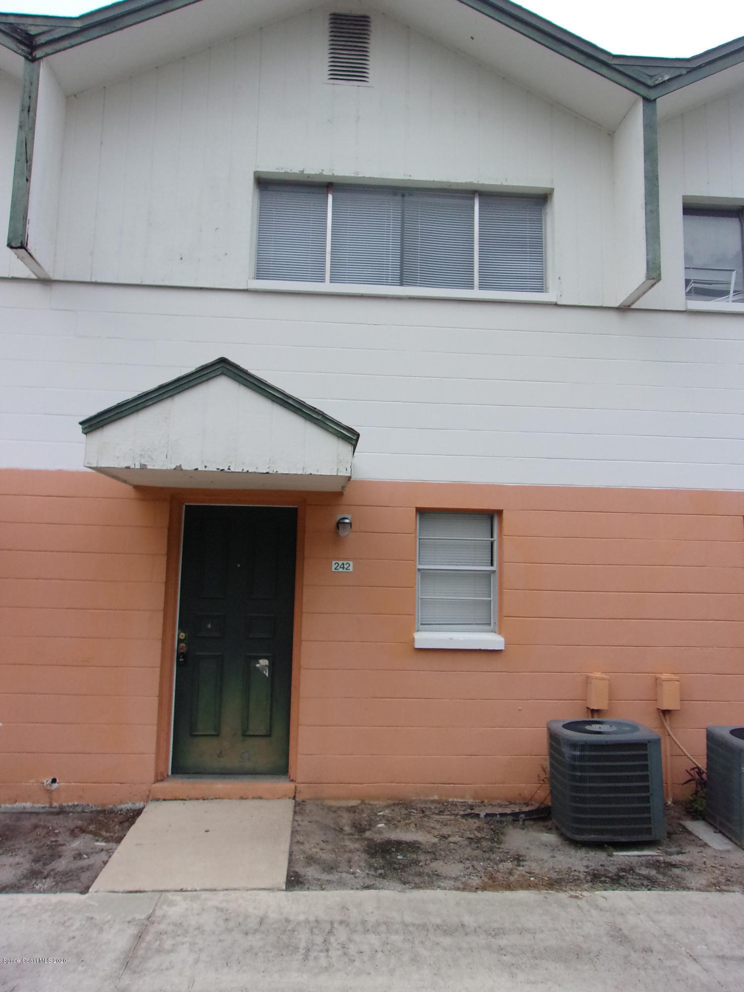 1711 Dixon Boulevard, Unit 242 Cocoa, FL 32922 - Photo 2 of 26 a front view of a house