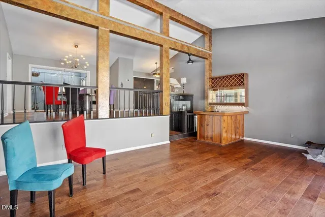 a view of kitchen with furniture and a potted plant