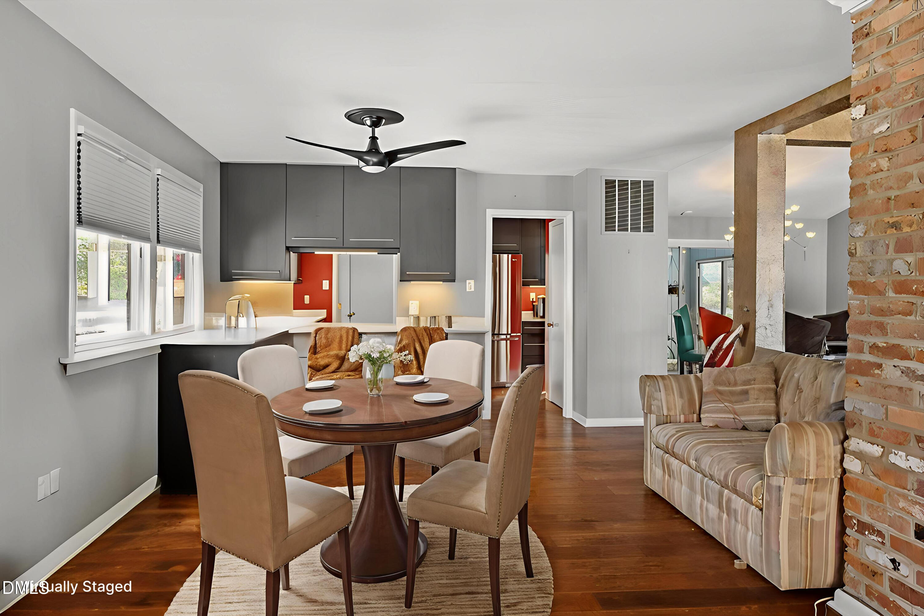 4501 Wingate Drive Raleigh, NC 27609 - Photo 13 of 36 a view of a dining room with furniture window and wooden floor