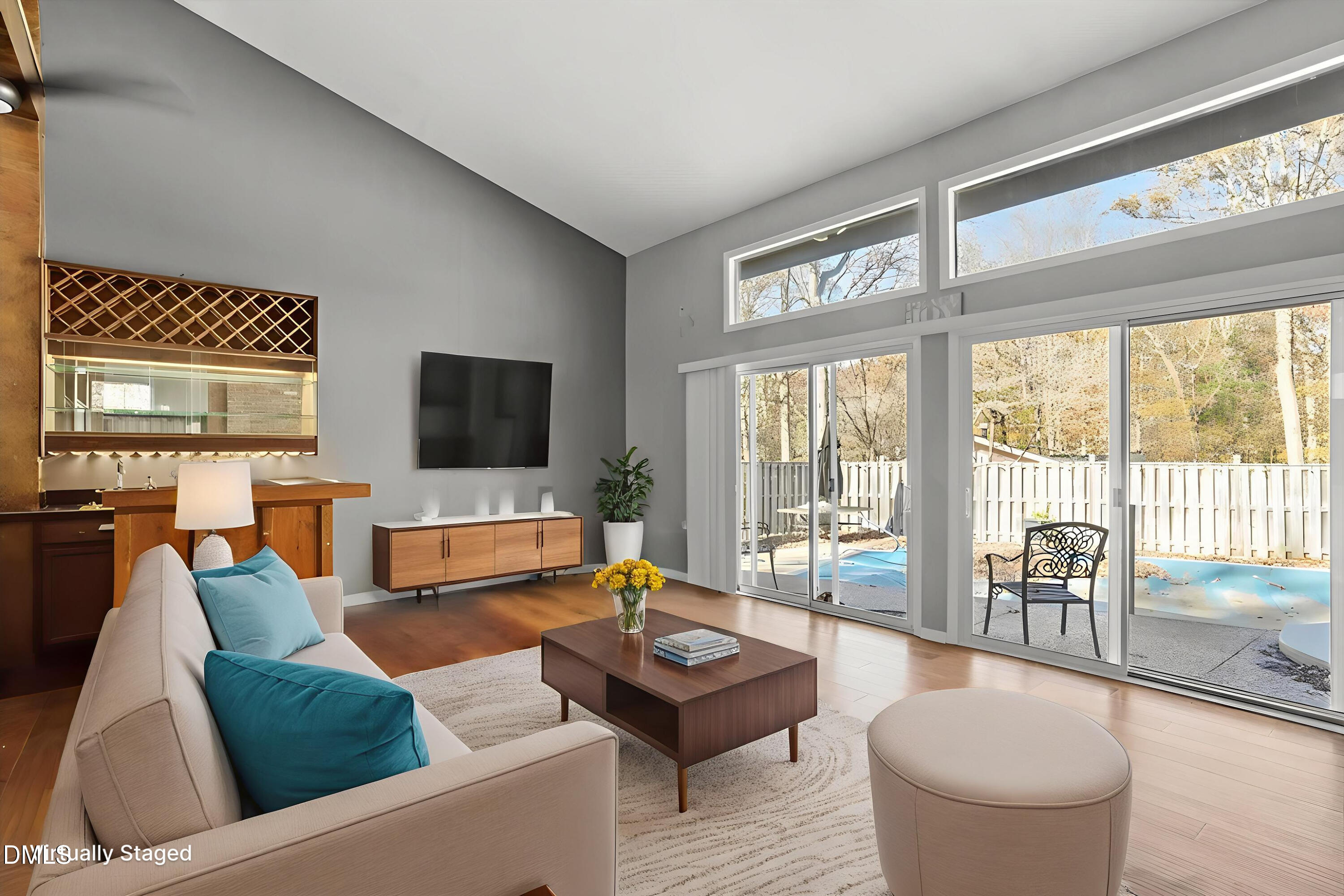 4501 Wingate Drive Raleigh, NC 27609 - Photo 16 of 36 a living room with furniture and a flat screen tv