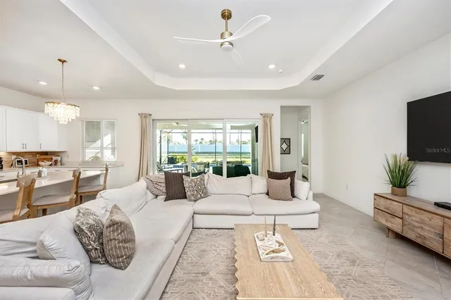 a white bath tub sitting next to a white sink