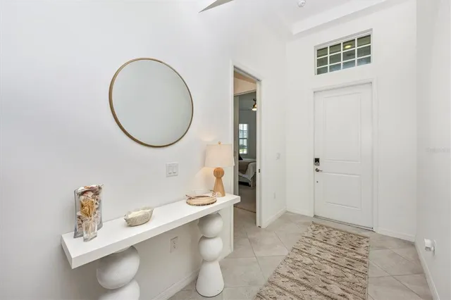 a view of a livingroom with furniture and a table