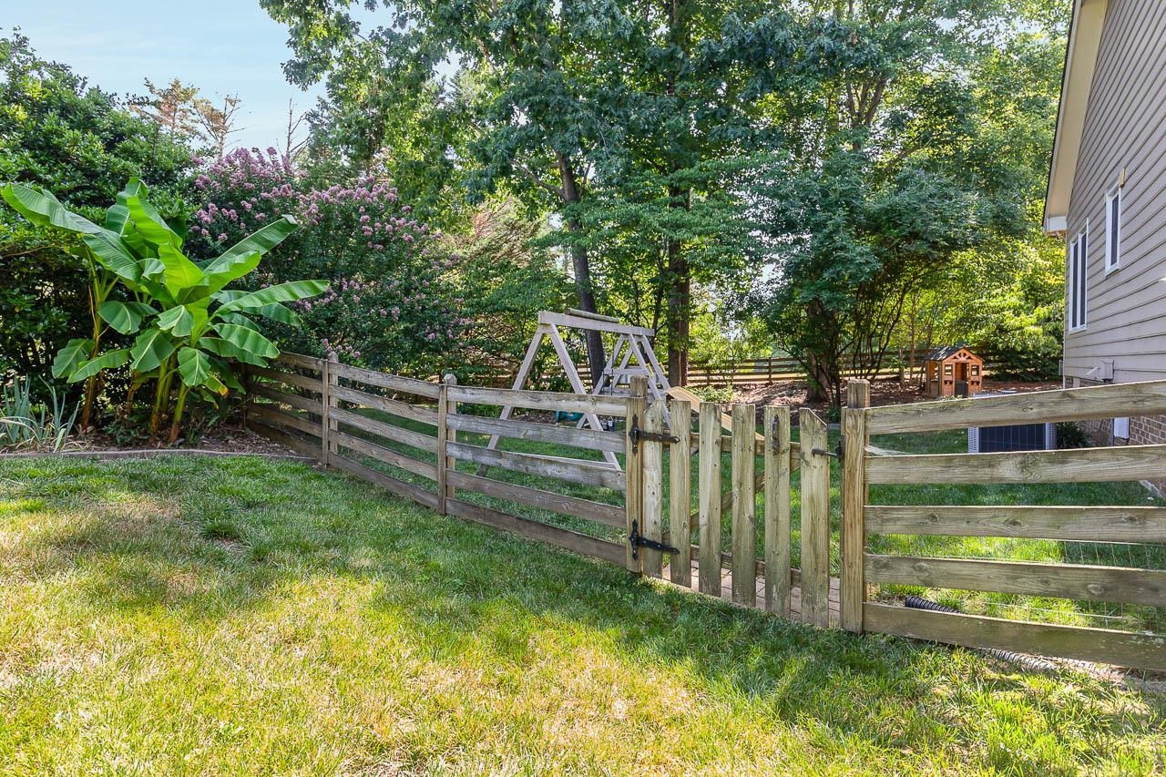 4209 Tolchester Place Raleigh, NC 27613 - Photo 4 of 26 Fenced Back Yard