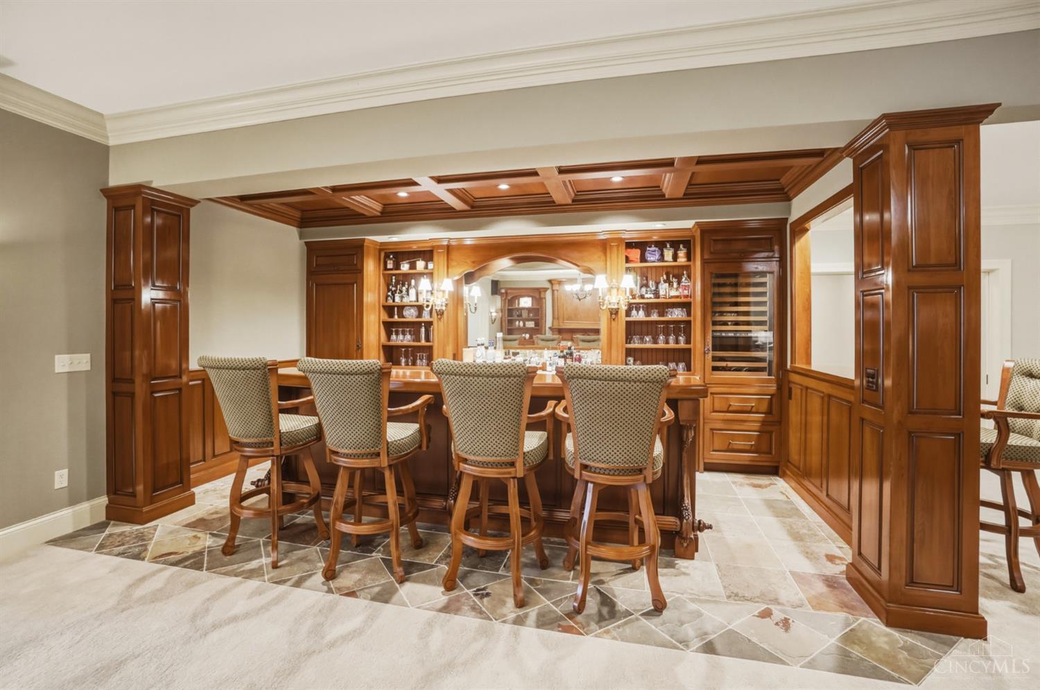 1054 Observatory Point Maineville, OH 45039 - Photo 54 of 82 Can you imagine entertaining friends and guests at this bar. Notice the coffered ceiling.