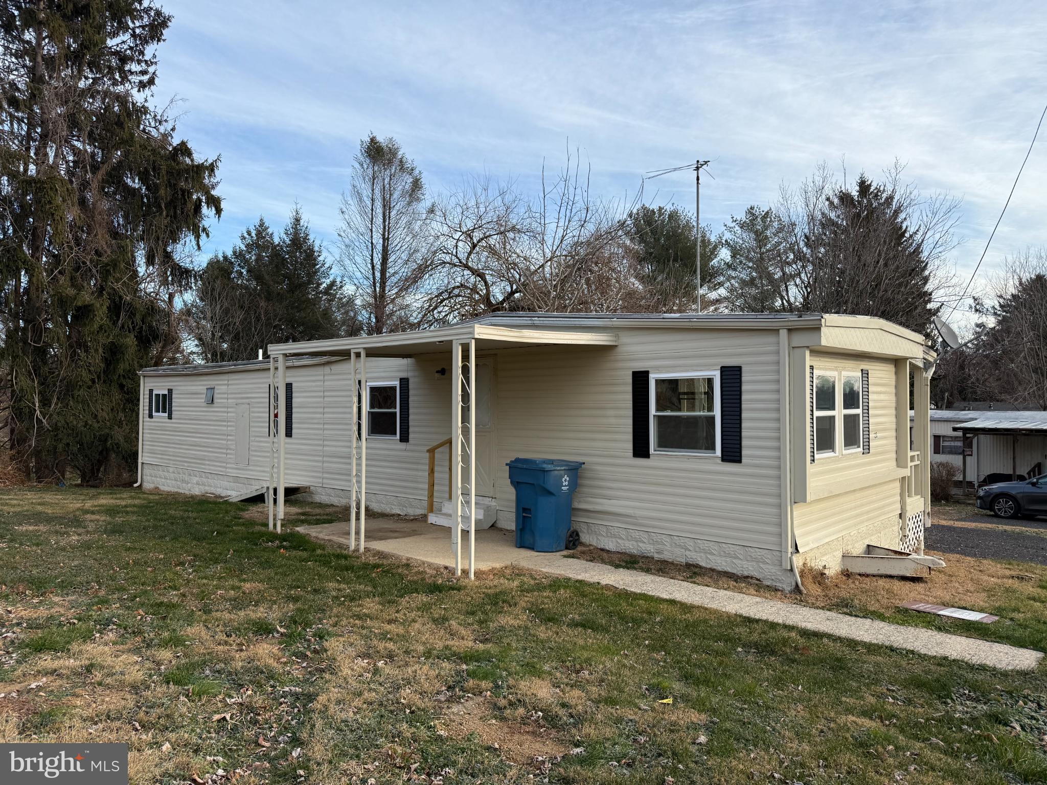 125 Santilli Road Landenberg, PA 19350 - Photo 2 of 7 front view of a house with a yard