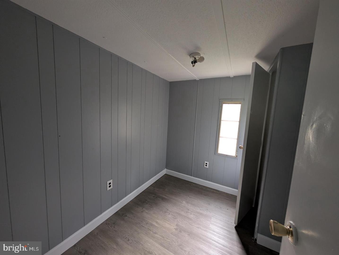 125 Santilli Road Landenberg, PA 19350 - Photo 6 of 7 an empty room with windows