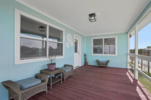 a view of kitchen with furniture and a potted plant
