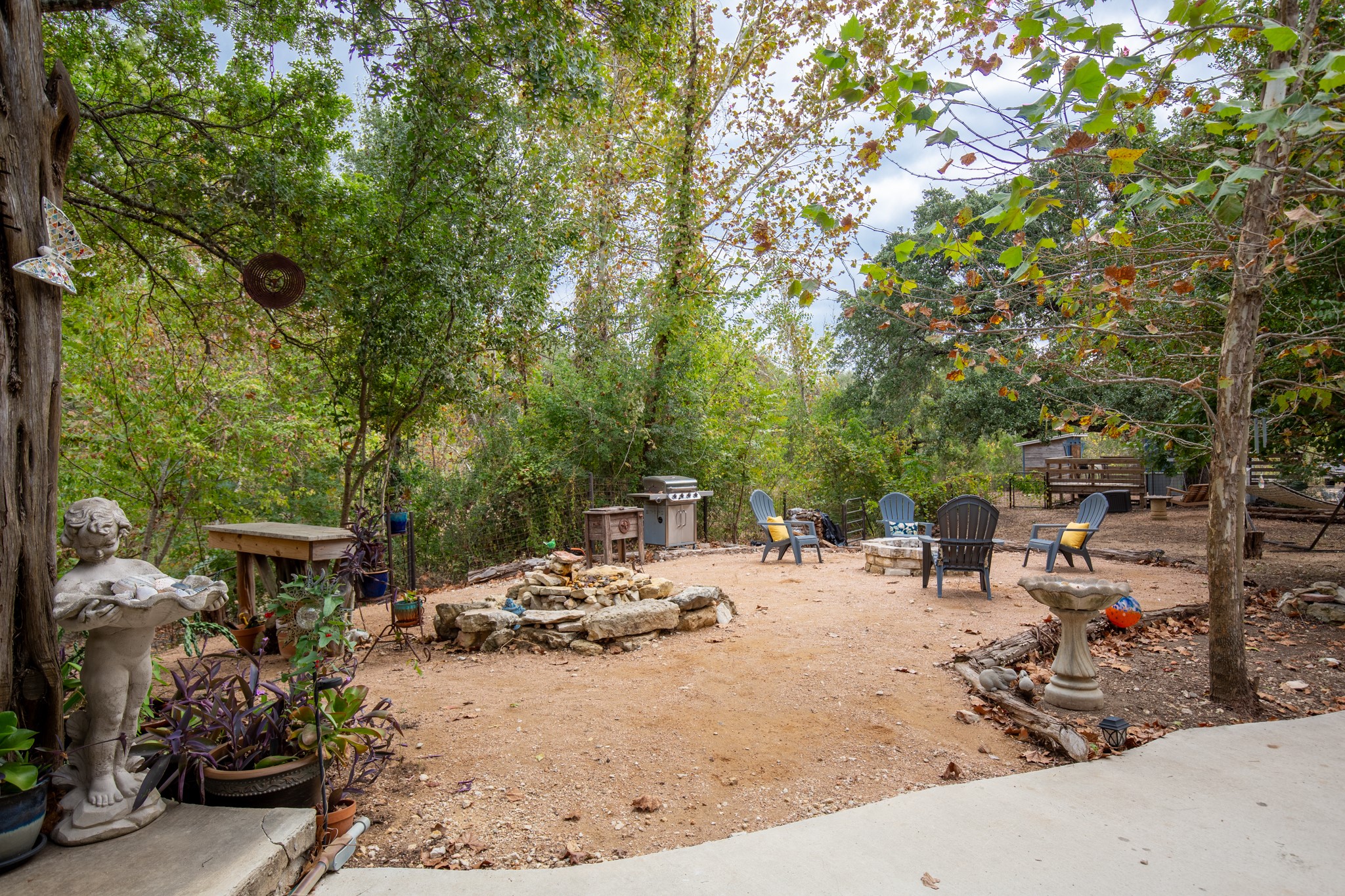 235 Smith Creek Road Wimberley, TX 78676 - Photo 21 of 40 a view of outdoor space with seating area