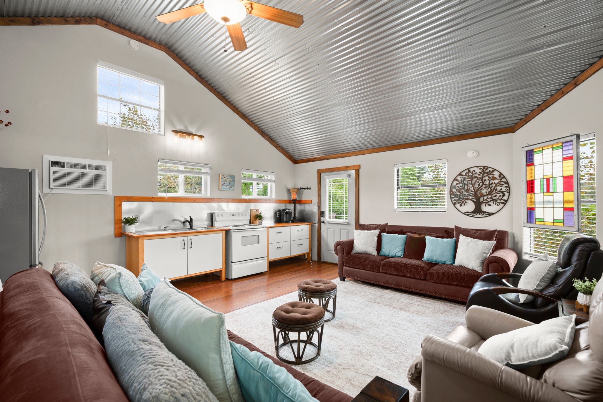 235 Smith Creek Road Wimberley, TX 78676 - Photo 25 of 40 a living room with furniture and a window