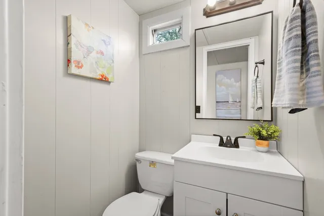 a view of a balcony with chairs