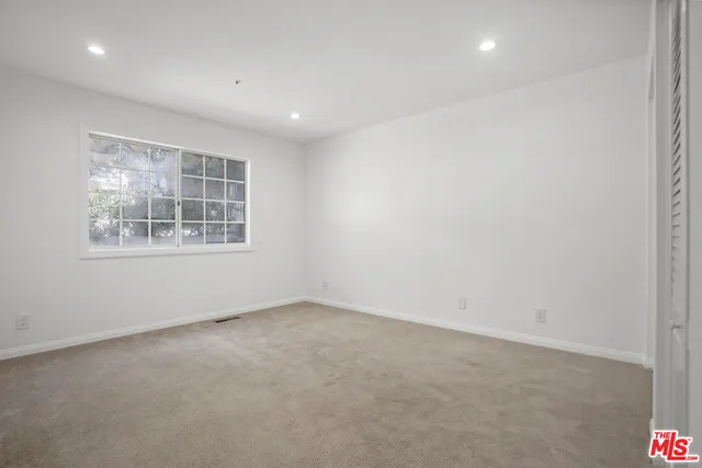 a view of a balcony with an ocean view