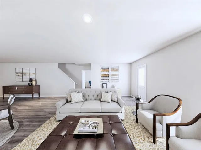 a dining room with furniture and wooden floor