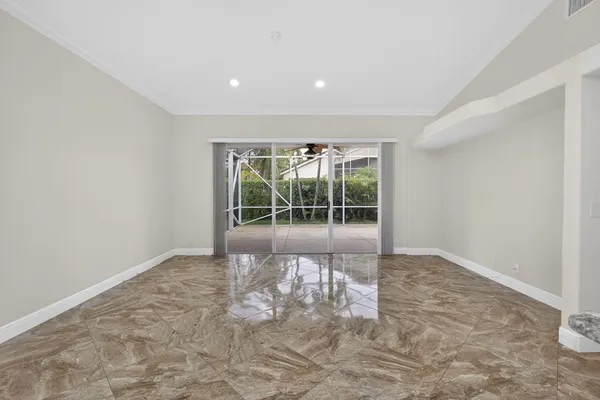a view of an empty room and window