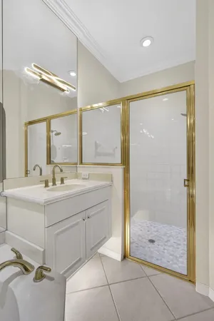 a view of a backyard with potted plants and a large window