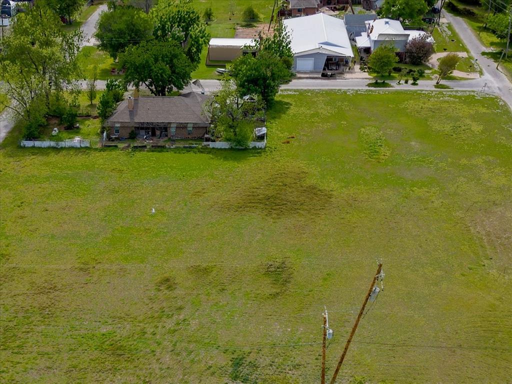 Tbd Tbd Tolar, TX 76476 - Photo 4 of 12 a view of a swimming pool with a yard