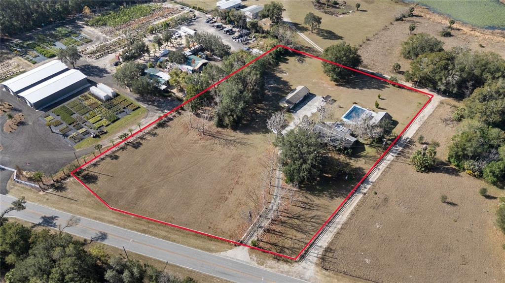 6604 Mt Plymouth Road Apopka, FL 32712 - Photo 28 of 31 an aerial view of a house