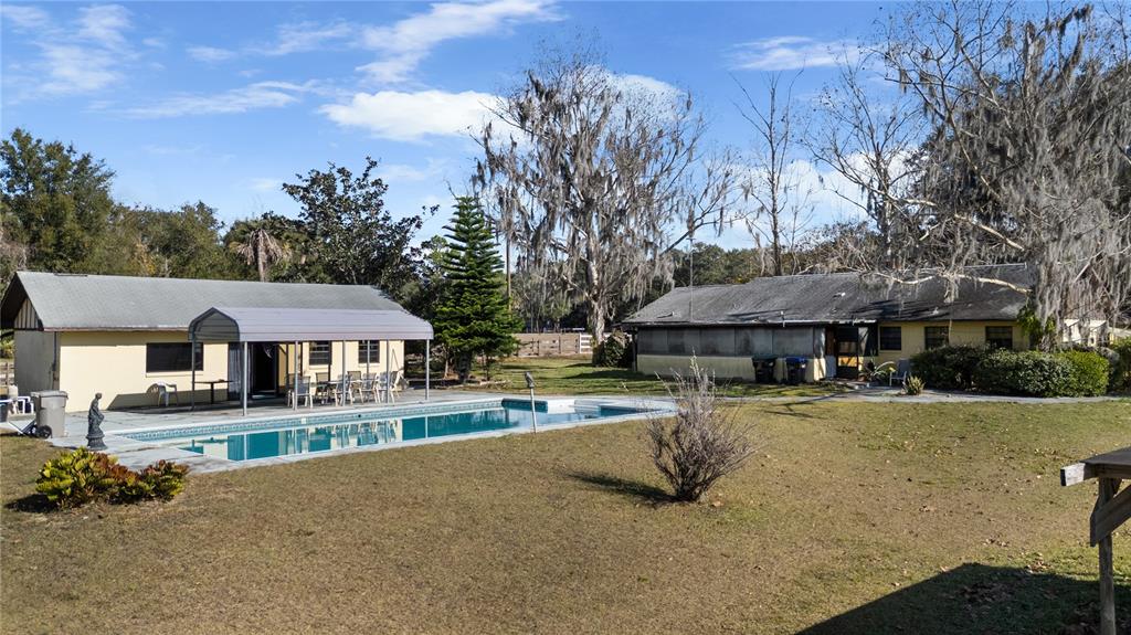 6604 Mt Plymouth Road Apopka, FL 32712 - Photo 6 of 31 front view of a house with a yard