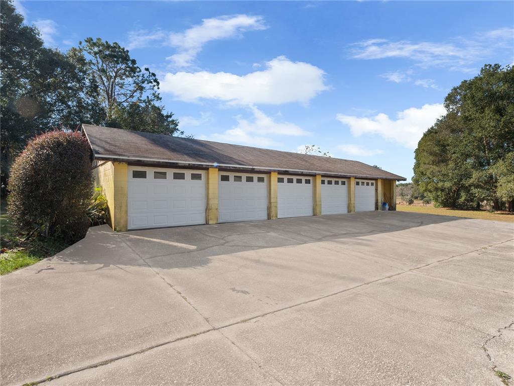 6604 Mt Plymouth Road Apopka, FL 32712 - Photo 7 of 31 a view of house with outdoor space and parking