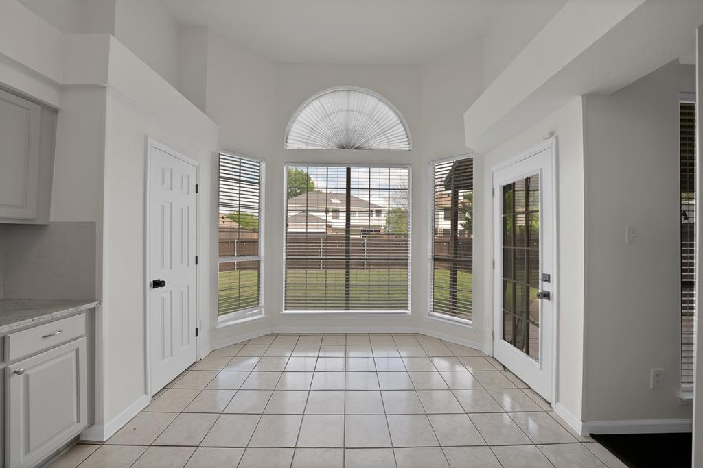 5418 Highgate Lane Rowlett, TX 75088 - Photo 16 of 36 a view of empty room with windows