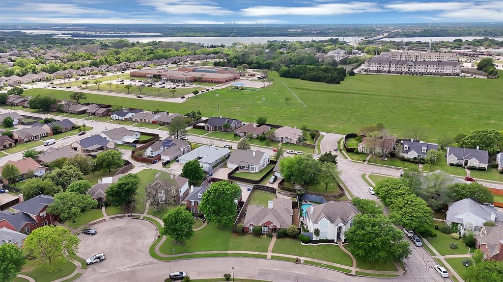 5418 Highgate Lane Rowlett, TX 75088 - Photo 34 of 36 an aerial view of a house with a garden
